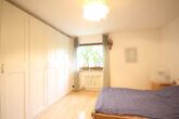 Vermietete Zweiraumwohnung mit Terrasse und kleinem Garten in Hürth-Efferen - Schlafzimmer1