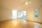 Helle 3-Zimmer Erdgeschosswohnung mit Terrasse und Garten in Hürth-Efferen - Wohnzimmer (1)
